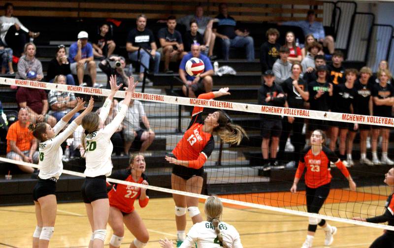 McHenry’s Alissa Ricci prepares to hit the ball against Crystal Lake South in varsity volleyball at McHenry Tuesday night.
