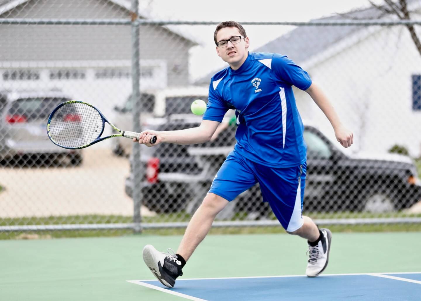 Princeton's Nolan Mallory makes a return against Coal City Tuesday. He won 6-1, 6-3 at No. 2 singles.