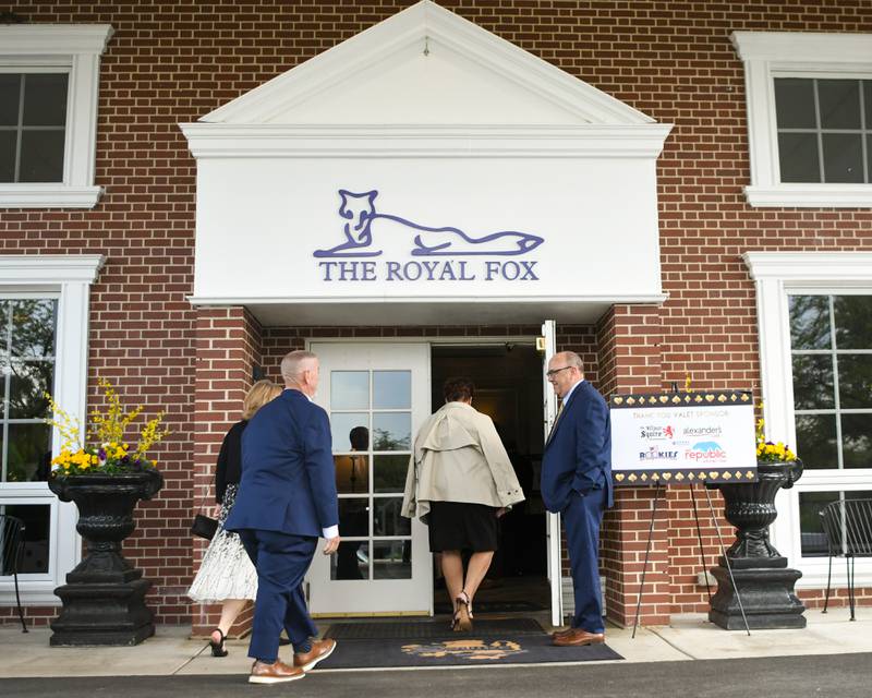 Attendees enter Royal Fox Country Club for the St. Charles Area Chamber of Commerce Charlemagne Awards dinner on Friday May 1, 2026.