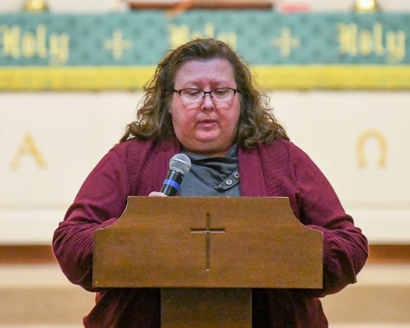 Pastor Lauri Allen of Mayfield Congregational United Church of Christ speaks during a prayer vigil for peace in Israel and Palestine held on Tuesday, Nov. 21, 2023, at the First Congregational United Church of Christ in DeKalb.