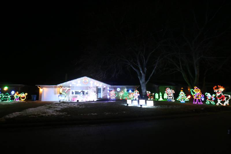 A large Christmas light display can be seen at the corner of Rock and 23rd Street on Wednesday, Dec. 17, 2025 in Peru.