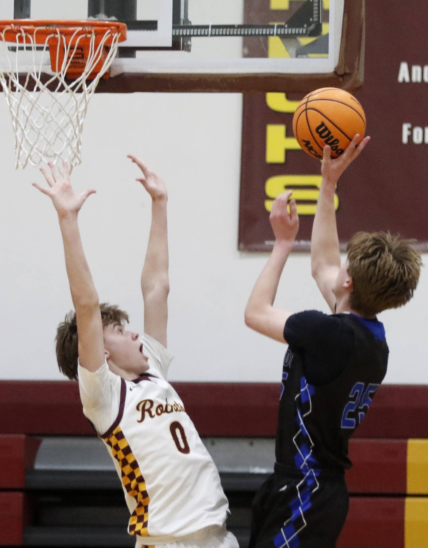Richmond-Burton's Gavin Radmer guards Woodstock's Liam Laidig as he shots the ball during a Kishwaukee River Conference boys basketball game on Friay Jan. 9  2026, at Richmond-Burton High School, in Richmond.