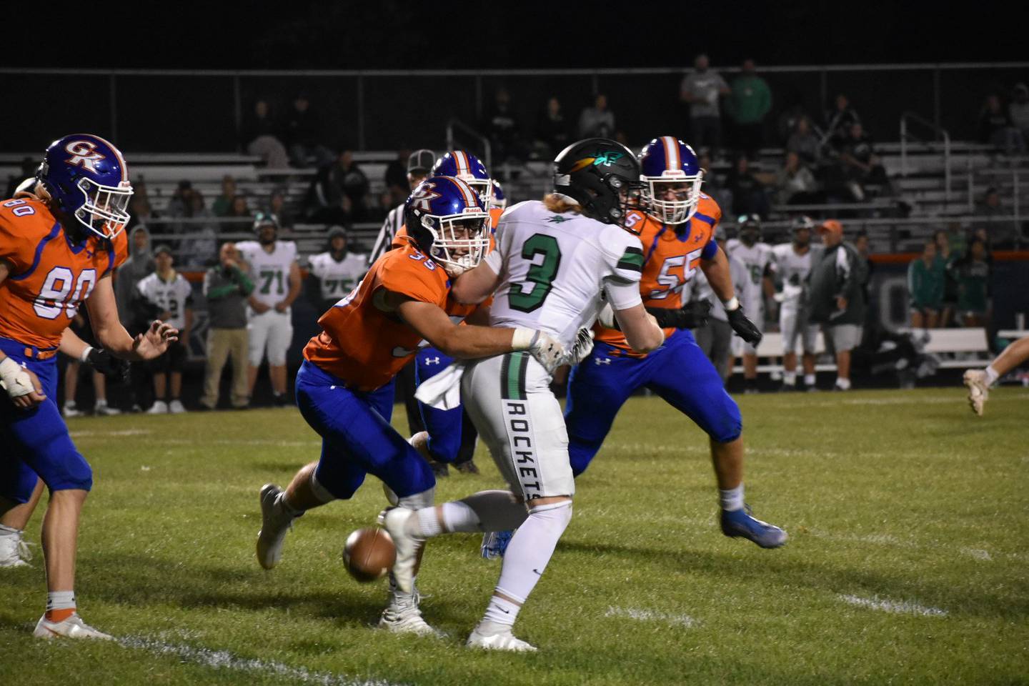 Colton Halter of Genoa-Kingston wraps up  Rock Falls quarterback Jordan Jones and causes a fumble in the Cogs' 41-0 win on Friday, September 24, 2021.