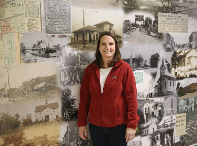 Mrs. Jenna Maierhofer poses for a photo in front of a mural on Tuesday, March 18, 2025 at Seneca High School.