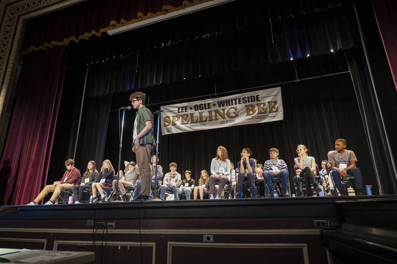 Thirty-two students from Lee, Ogle and Whiteside Counties compete Thursday, Feb. 20, 2025, at Dixon High School in the regional Spelling Bee. All students on stage have won the chance to compete by taking the top spot at their respective schools.