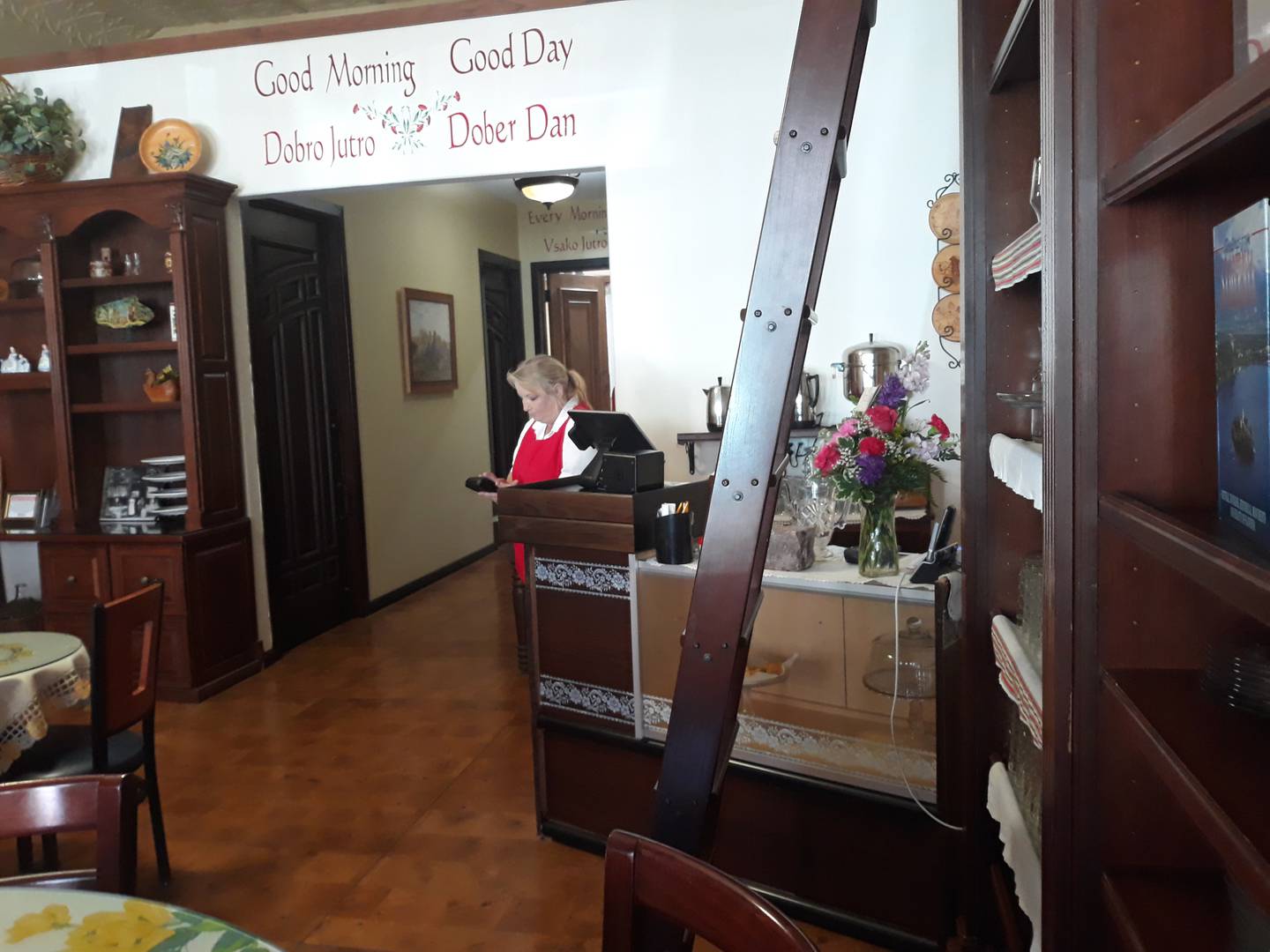 A hostess gets ready to serve a table Friday, June 17, 2022, at the Good Morning Good Day restaurant in downtown Streator.