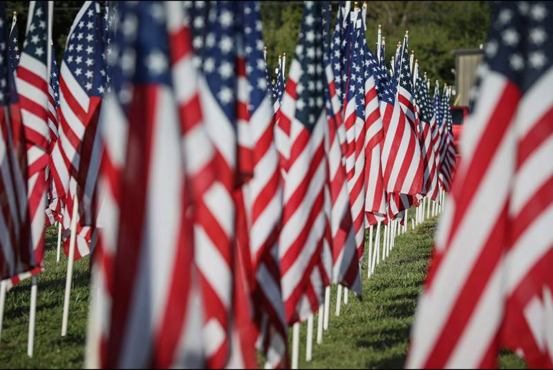 American flags pictured during a Sept. 11 anniversary ride in Woodstock Sept. 6, 2025.
