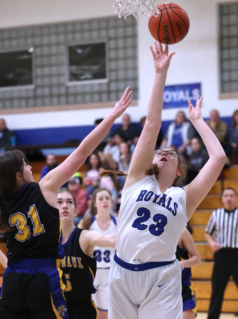 Hinckley-Big Rock's Sami Carlino shoots inside over Somonauk's Brynn Pennington during their game Thursday, Jan. 12, 2023, at Hinckley-Big Rock High School.