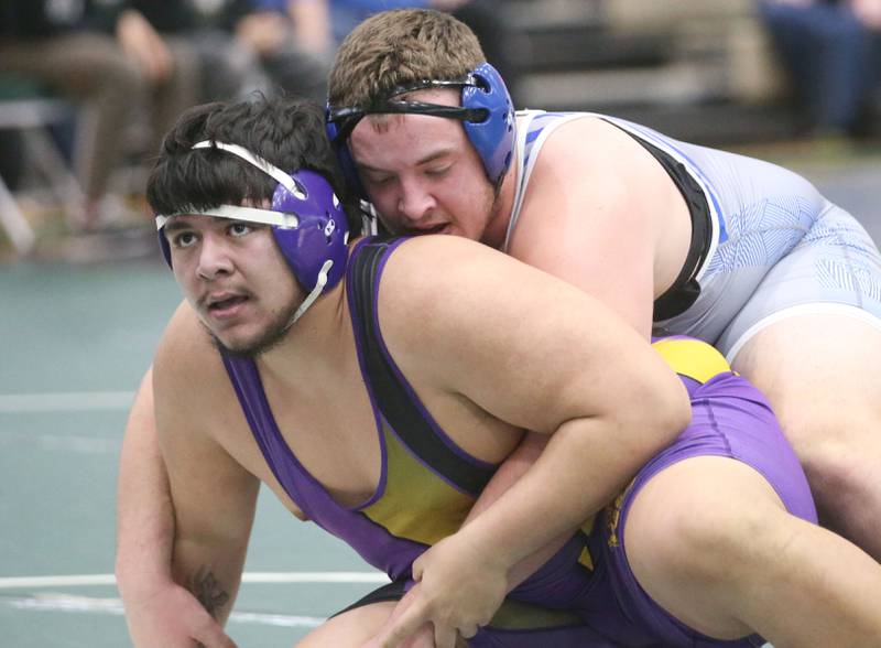 Mendota's Angil Serrano wrestles Princeton's Cade Odell in the 285 weight class during the Class 1A Regional meet on Saturday, Feb. 8, 2025 at St. Bede Academy.