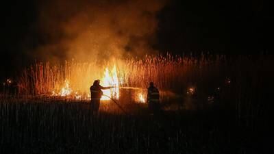 Photos: First responders battle brush fire near McHenry