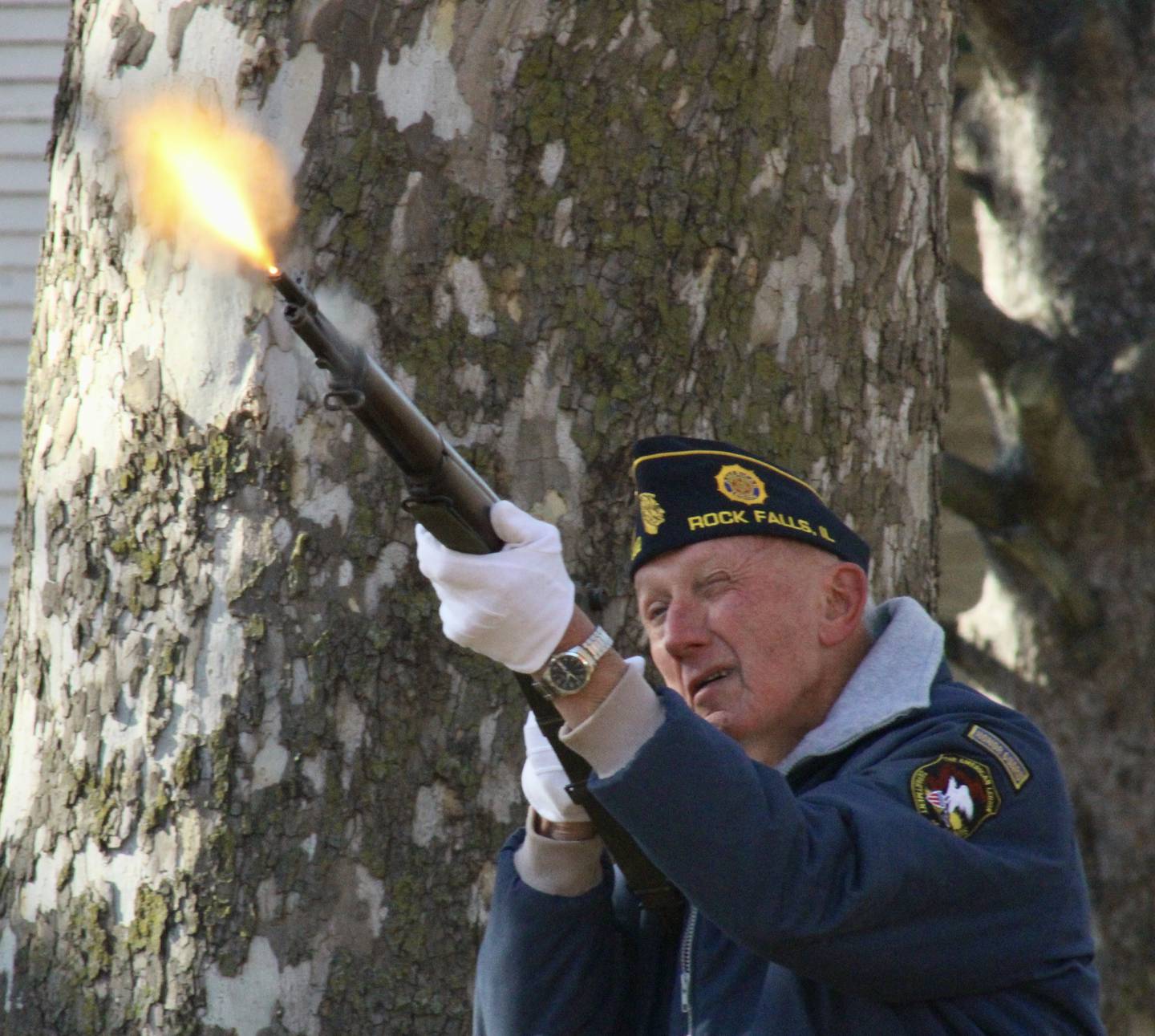 An honor guard from Rock Falls American Legion Post 902 fires a rifle salute during Veterans Day observances Friday, Nov. 11, 2022 at Veterans Memorial Park in Rock Falls.