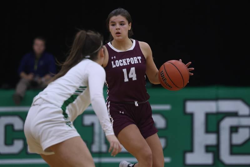 Lockport’s Veronica Bafia works the ball against Providence.