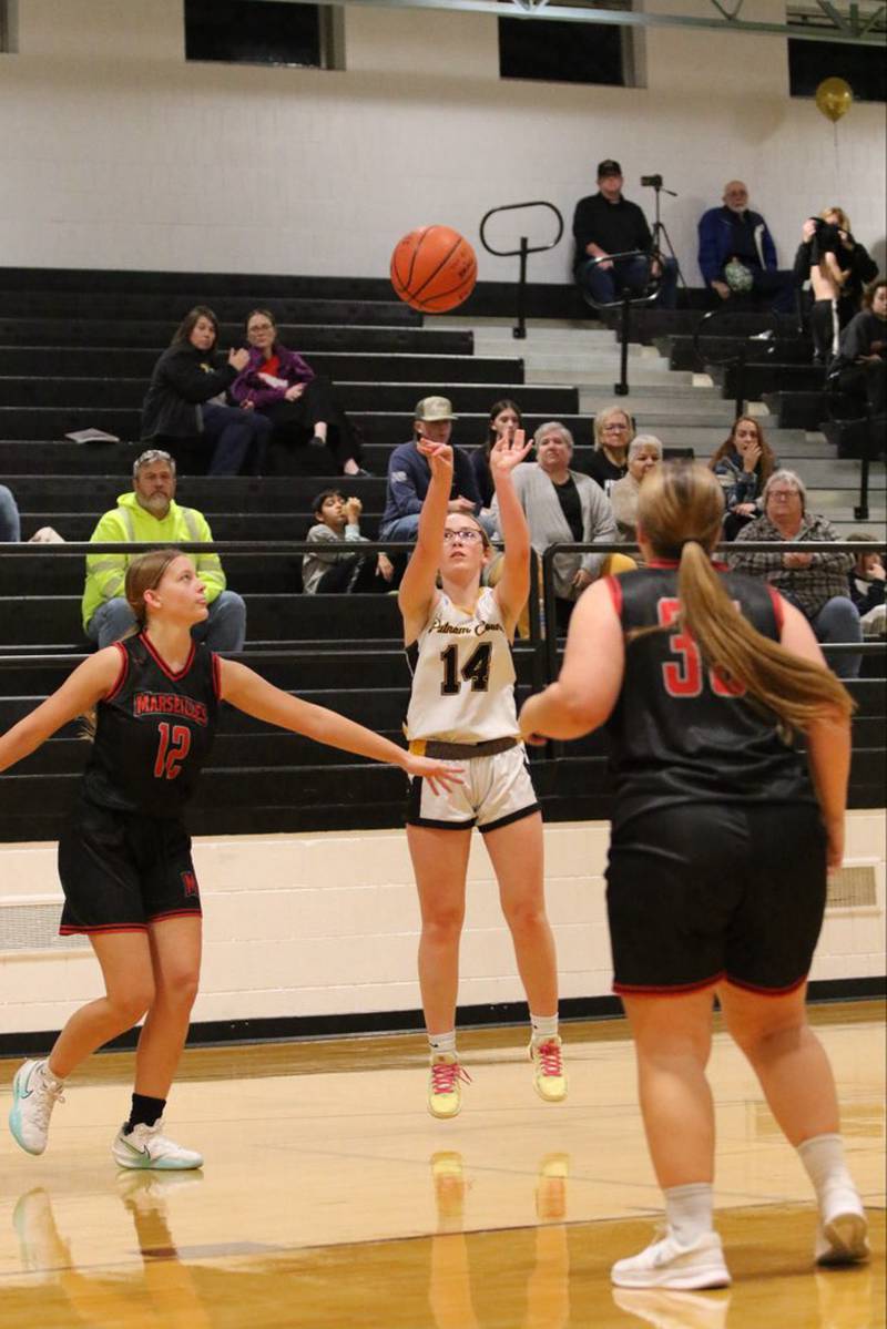 PC's Jaylynn Dickey sinks the 3 in Tuesday's Putnam County 8th grade night. The Pumas beat Marseilles 51-15.