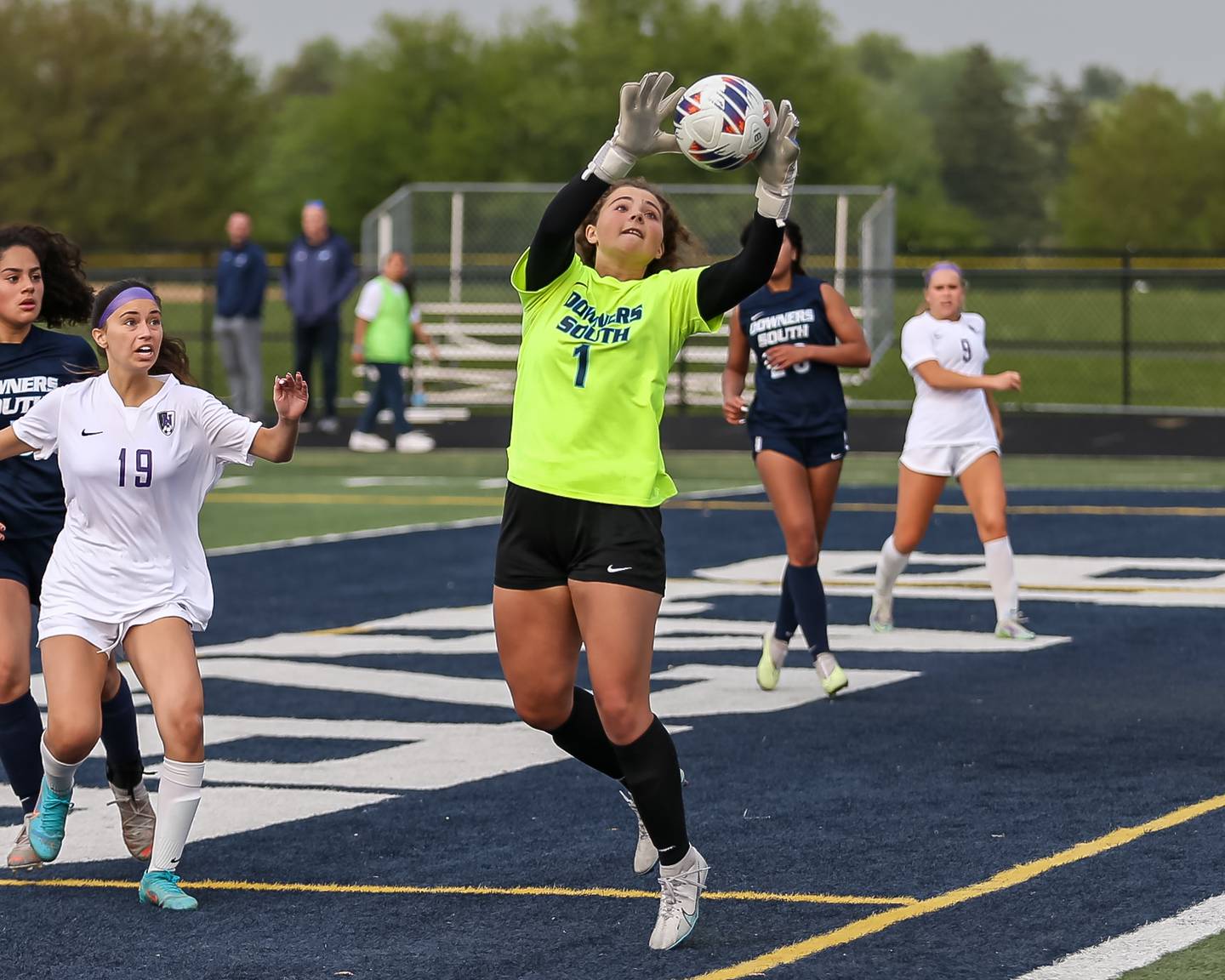 Downers Grove South's Hannah Fedinec (1) blocks a kick during Class 3A Addison Trail Regional final soccer match between Downers Grove South at Downers Grove North.  May 19, 2023.