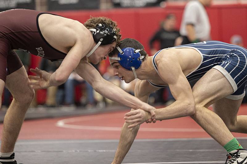 Newman’s Carter Rude (right) and Rockridge’s Reese Finch go for the 138 pound title Saturday, Dec. 17, 2022 at the Erie-Prophetstown Holiday Tournament.