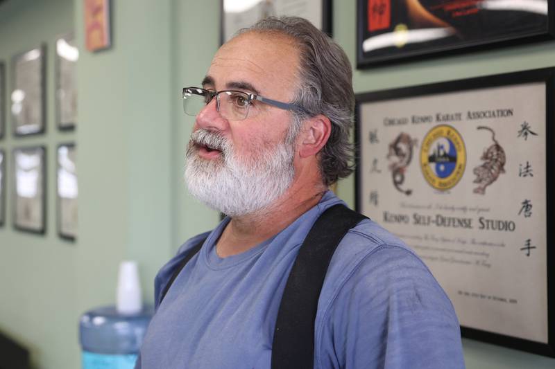 Dan Butler stands in his dojo, Kenpo Self Defense Studio, Inc. in Oak Forest on Tuesday, July 25.