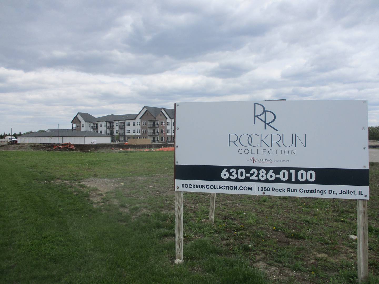 A sign promoting the Rock Run Collection project stands outside The View, a 570 unit apartment complex under development at the site. May 6, 2026