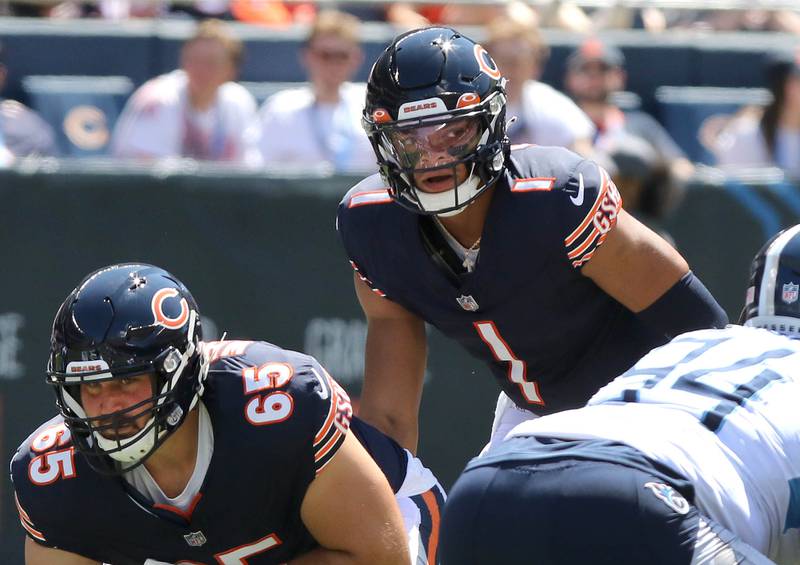 Chicago Bears quarterback Justin Fields looks over the Tennessee Titans defense during their preseason game Saturday, Aug. 12, 2023, at Soldier Field in Chicago.