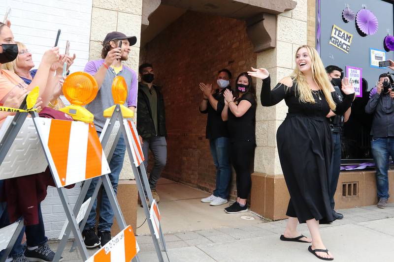 Grace Kinstler, a Crystal Lake Central High School graduate and finalist on "American Idol," waves to fans as she makes her appearance at the Raue Center for the Arts on Tuesday, May 18, 2021, in Crystal Lake.