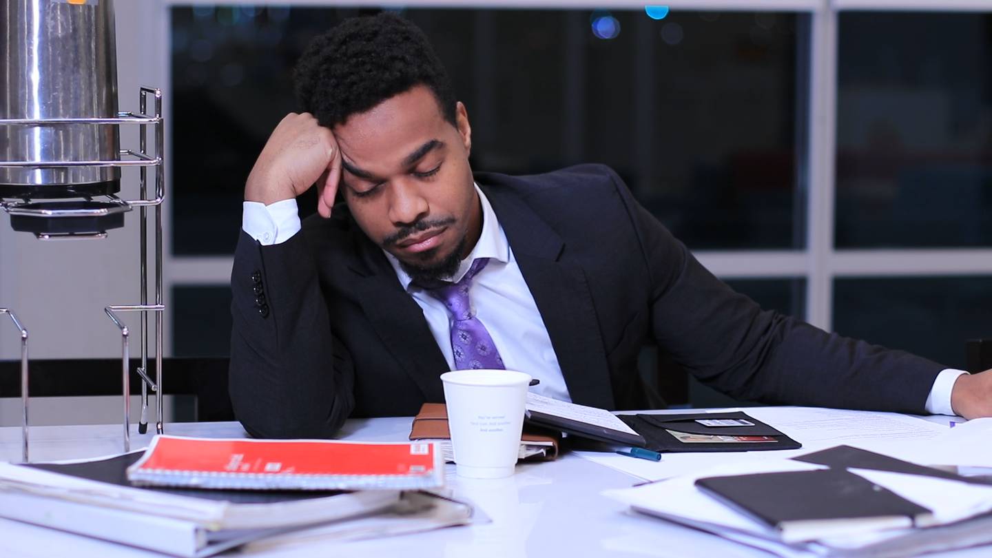 Frank Lee III portrays the newly appointed general manager of the fictional West Town Mall in "The Mall Messiah," who also happens to be asleep on the job in the employee lounge. "The Mall Messiah" by GSW Network is a contemporary, multimedia live production on finding hope and miracles in unexpected places.