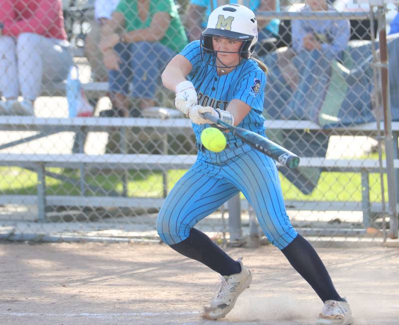 Marquette's Hunter Hopkins gets a hit against Seneca on Monday, May 11, 2026 at June Gross Field in Ottawa.