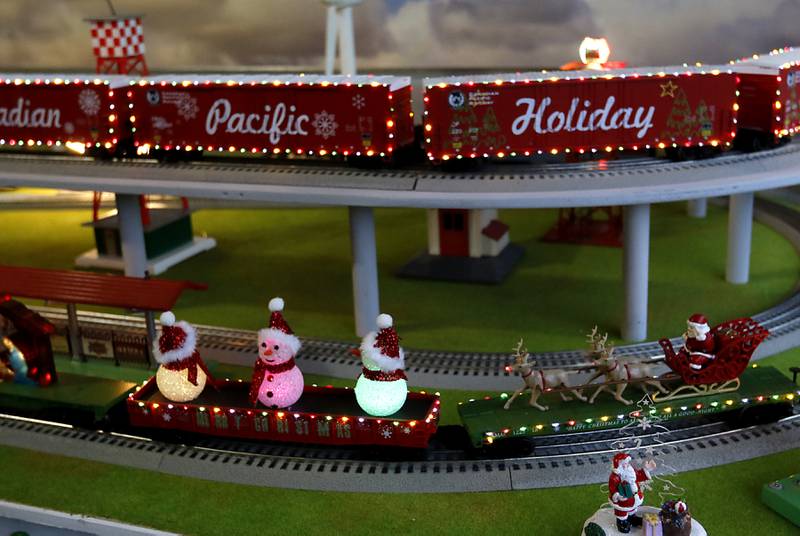 A section of John Smith’s holiday-themed trains on Thursday, Dec. 19, 2024, at his home in McHenry. He has been opening up his garage along the riverwalk during the weekends for people to see the trains.