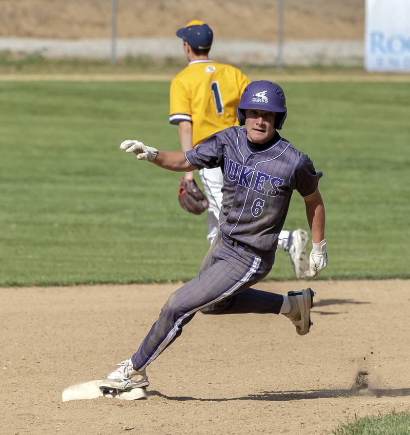 Dixon’s Jack Redell rounds second against Sterling Friday, May 23, 2025.