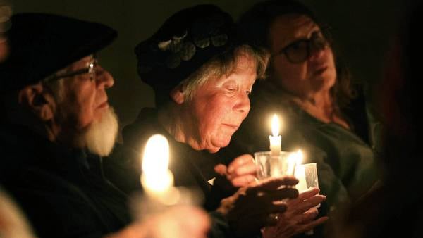 Photos: DeKalb church holds vigil to promote peace, remember lives lost in ICE related shootings in Minnesota