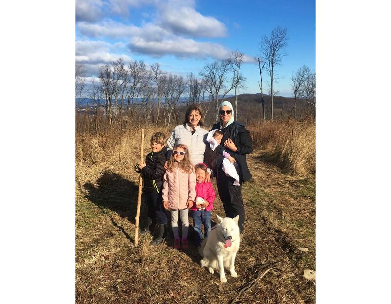 Carmel Perino of Homer Glen is pictured with her daughter Andrea "Onnie" Richter of Virginia and Carmel's grandchildren (from left) Isaac, Isabelle, Iliana and Israella Richter. The photo was taken just one week before Carmel's sudden death on Dec. 14 at the age of 72.