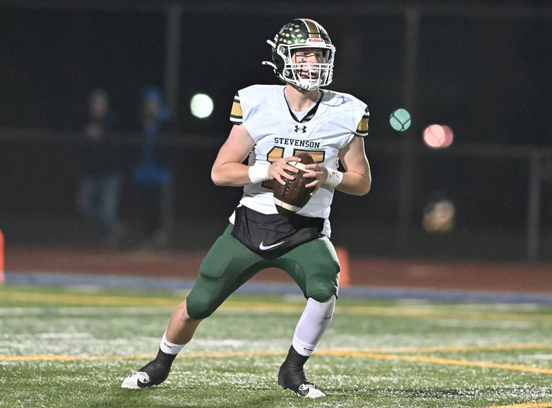Stevenson's Aidan Elliot (15) looks to throw a pass during the IHSA Class 8A Quarterfinals game against Lincoln-Way East on Friday, Nov. 15, 2024, at Frankfort. (Dean Reid for Shaw Local News)