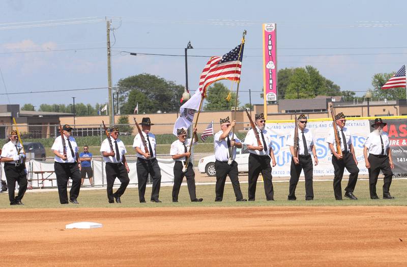 Members of the Peru Veterans Memorial Group walk onto the field before the Illinois Valley Pistol Shrimp game honoring Veterans on Thursday, July 3, 2025 at Schweickert Stadium in Peru.
