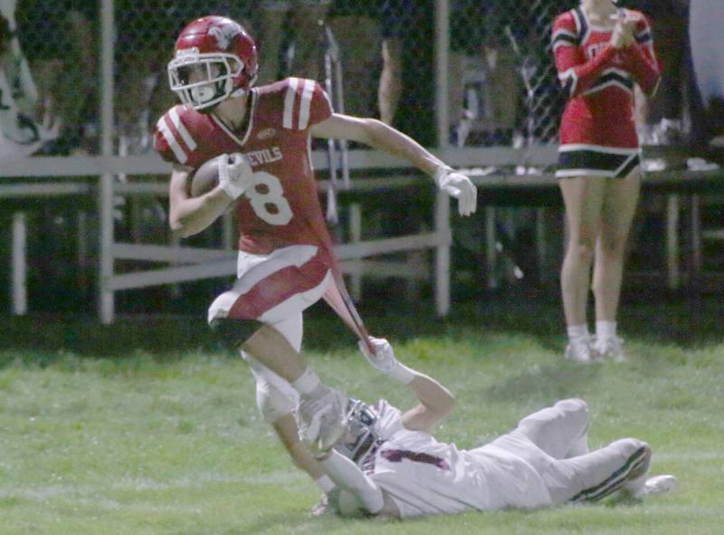 Hall's Braden Curran breaks free of Illinois Valley Central's Ryan Adler on Friday, Sept. 29, 2023 at Richard Nesti Stadium.