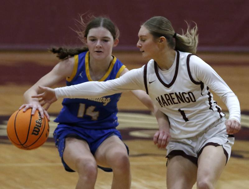 Marengo's Myah Broughton tries to steal the ball from Johnsburg's Summer Toussaint during a Kishwaukee River Conference basketball game on Saturday, Feb. 1, 2025, at Marengo High School.