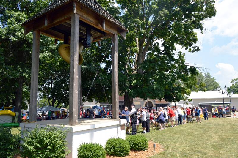 The Illinois Freedom Bell is rung 13 times at exactly 1 p.m. on July 4, 2023, in Mt. Morris, by residents and officials during the village's annual Let Freedom Ring celebration.