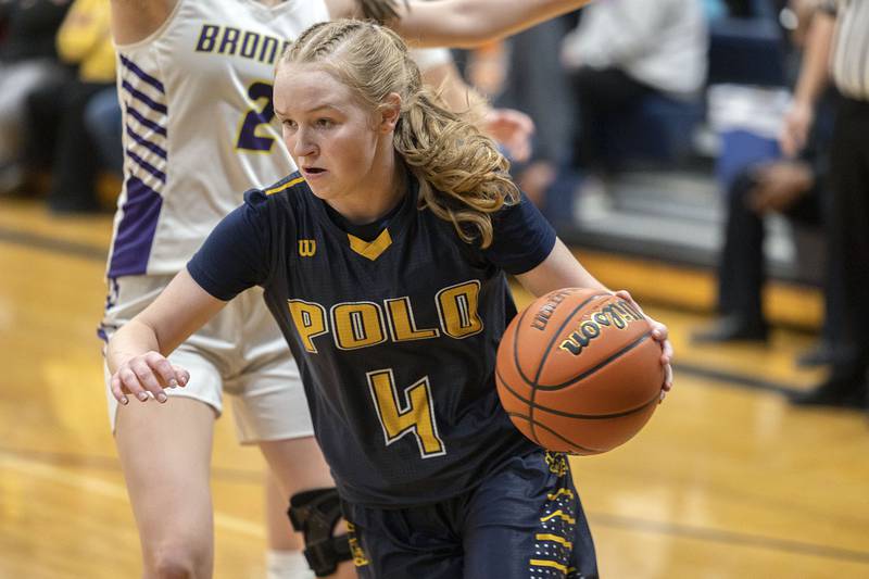 Polo’s Camrynn Jones drives the baseline Tuesday, Feb. 21, 2023 in the sectional semifinal against Orangeville.