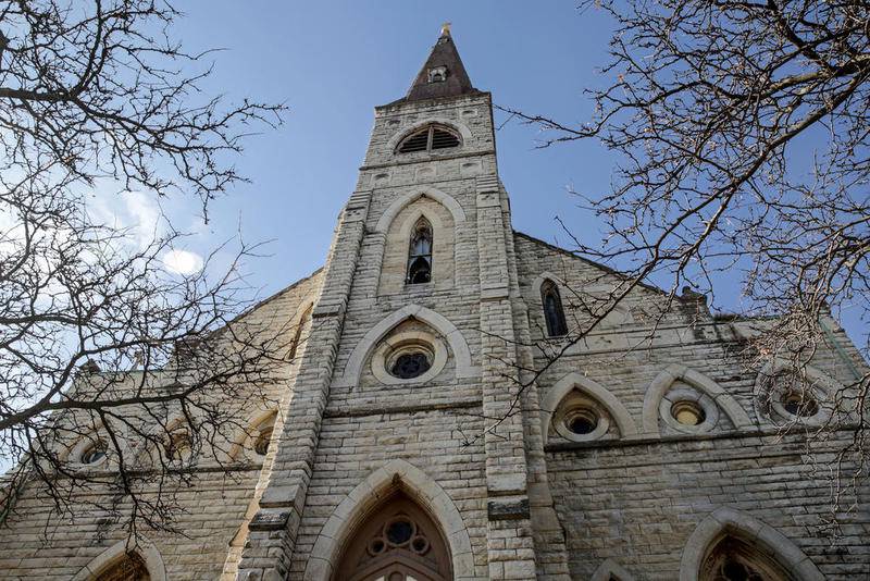 The front steeple of St. Mary Carmelite Church can be seen Friday, Nov. 22, 2019, in downtown Joliet.