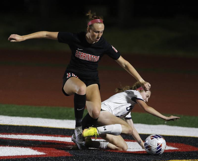 Barrington's Kate Lubinsky goes after the ball as O'Fallon's Allie Tredway defends during the IHSA Class 3A state championship match at North Central College in Naperville on Saturday, June 3, 2023.