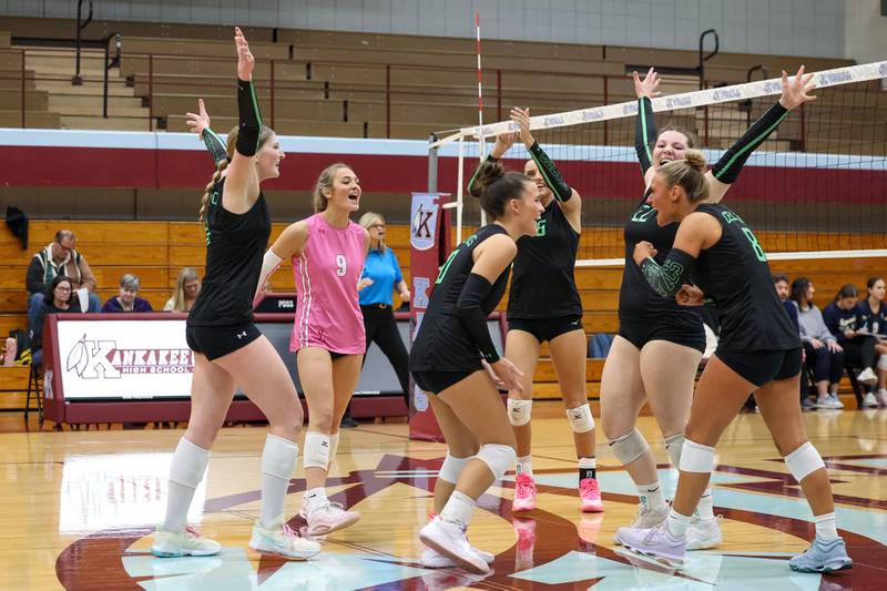 Providence players gather to celebrate a point during Providence's victory in two sets, 25-25, 25-18, over Lemont in the IHSA Class 3A Kankakee Sectional championship on Thursday, Nov. 6, 2025.