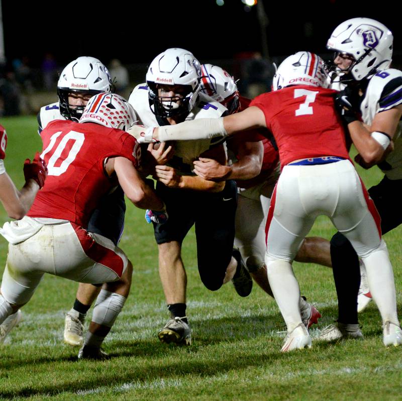 Dixon's Landon Knigge (4) heads to the end zone on Friday, Sept. 26, 2025 at Landers-Loomis Field in Oregon.