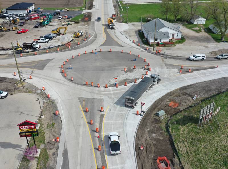 Motorists drive through the roundabout at the intersection of  Illinois Route 178 and Illinois Route 71 on Wednesday, April 19, 2023 in Utica. IDOT temporary converted traffic to use the circle while crews can work in the center. All lanes will remain open but motorists will have to yield to traffic prior to entering the roundabout. The project is scheduled to be completed by mid-June.