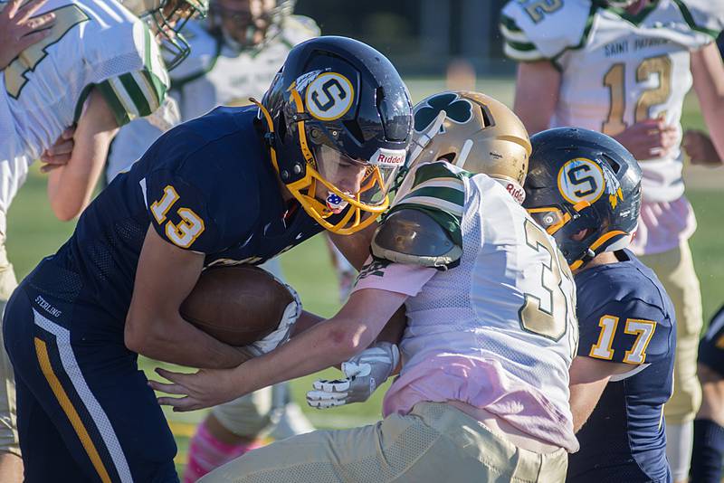 Sterling's Manuel Cano picks up yards Saturday, Oct. 30, 2021 against St Patrick.