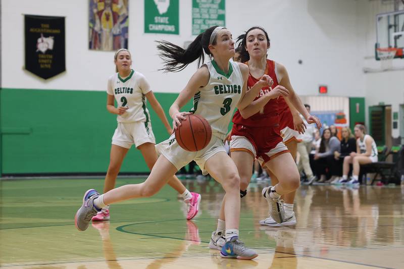 Providence’s Molly Knight drives to the basket against Mother McAuley on Monday, Jan. 8th, 2024 in New Lenox.