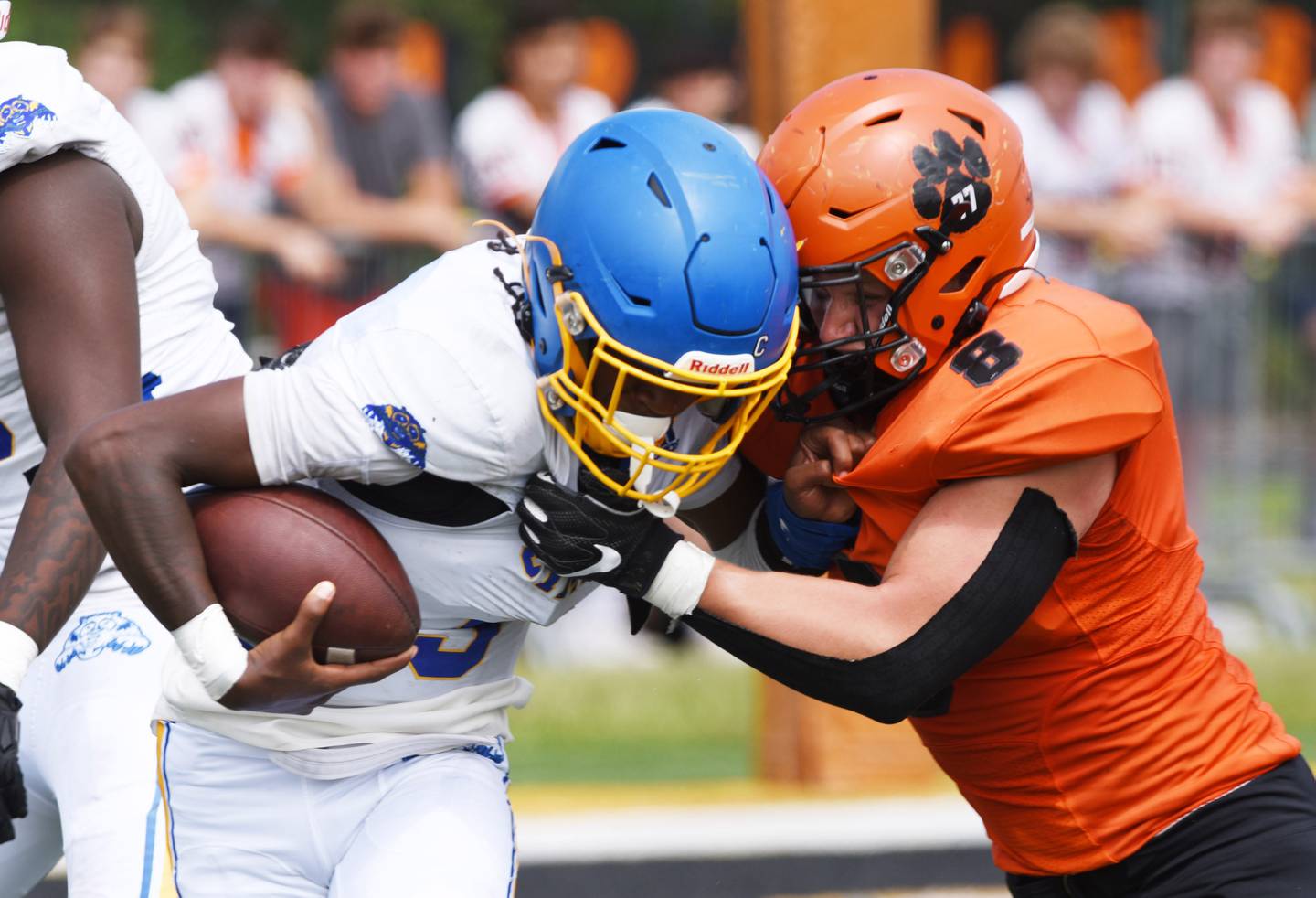 Joe Lewnard/jlewnard@dailyherald.com
Wheaton Warrenville South’s Joshua Pratt tackles Simeon quarterback Keshaun Parker during Saturday’s game in Wheaton.