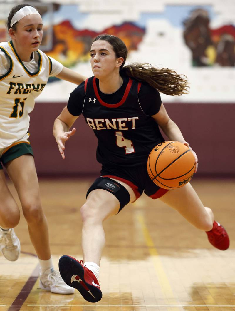 FremdÕs Gracie Todd (15) guards Benet Academy's Ava Mersinger (4) during the Montini girls basketball Christmas tournament Saturday, Dec. 28, 2024 in Lombard.