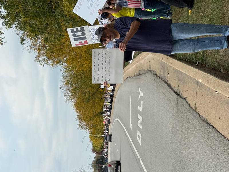 Some of the several hundred people who came out for the Bolingbrook No Kings Day protest at the northeast corner of Janes Avenue and Boughton Road on Saturday, Oct. 18, 2025. The turnout was estimated to reach more than 1,000 as protesters extended all the way to the Interstate 355 intersection and lined both sides of Boughton Road.