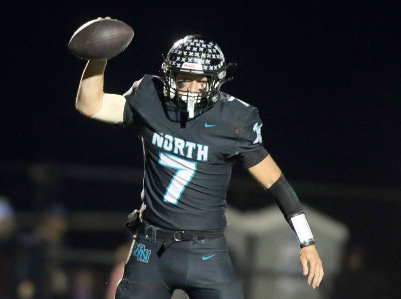 Woodstock North’s Parker Halihan celebrates after landing in the end zone with a touchdown against Woodstock in varsity football at Woodstock North High School on Friday, October 24, 2025.