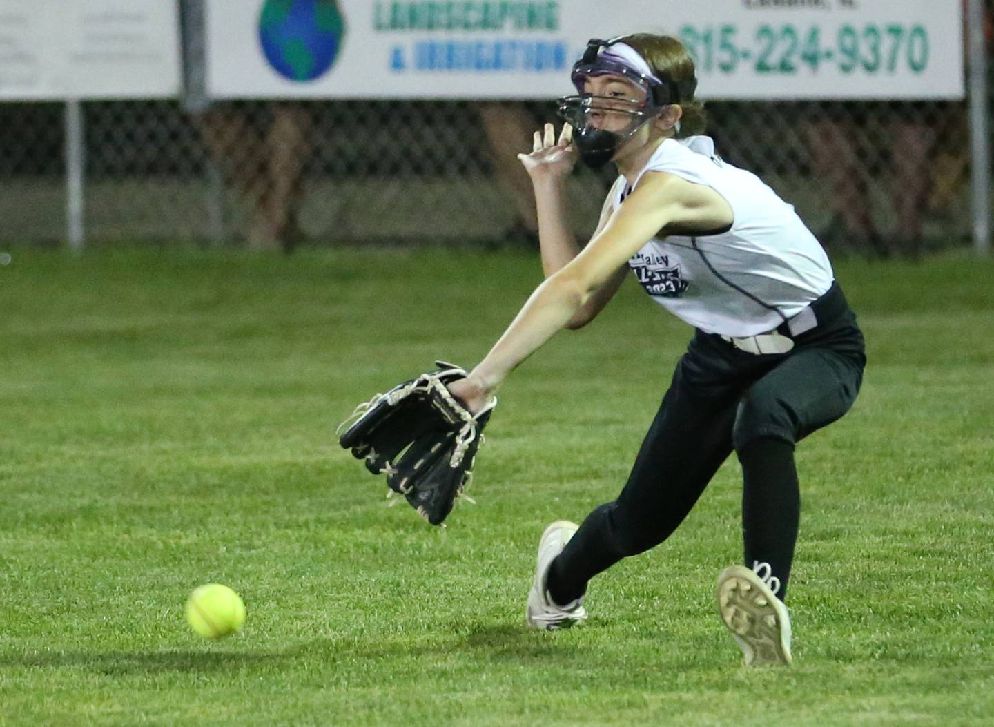 Spring Valley's Charlee Herrick fields a ground ball against Evergreen Park in the Minor League Softball State title game on Thursday, July 27, 2023 at St. Mary's Park in La Salle.