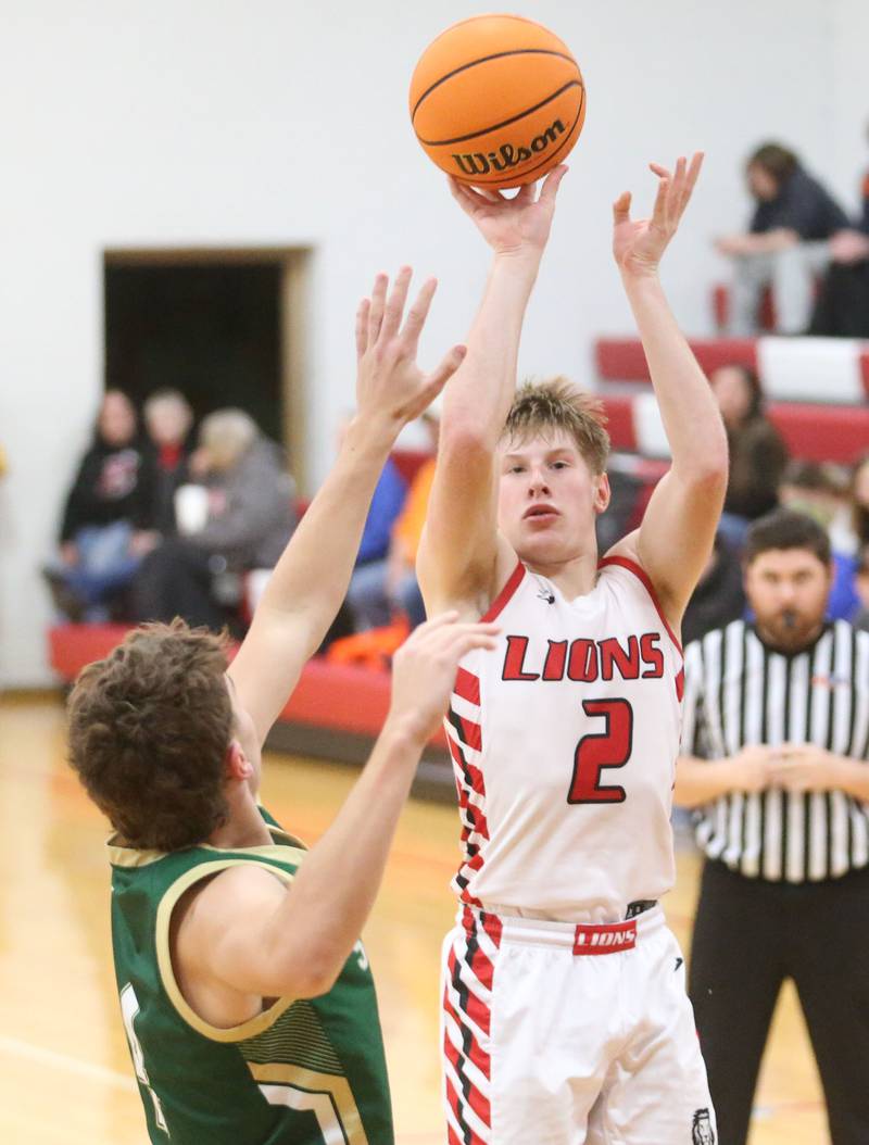 LaMoille's Brayden Klein lets go of a shot over St. Bede's Gino Ferrari on Tuesday, Feb. 11, 2025 at LaMoille High School.