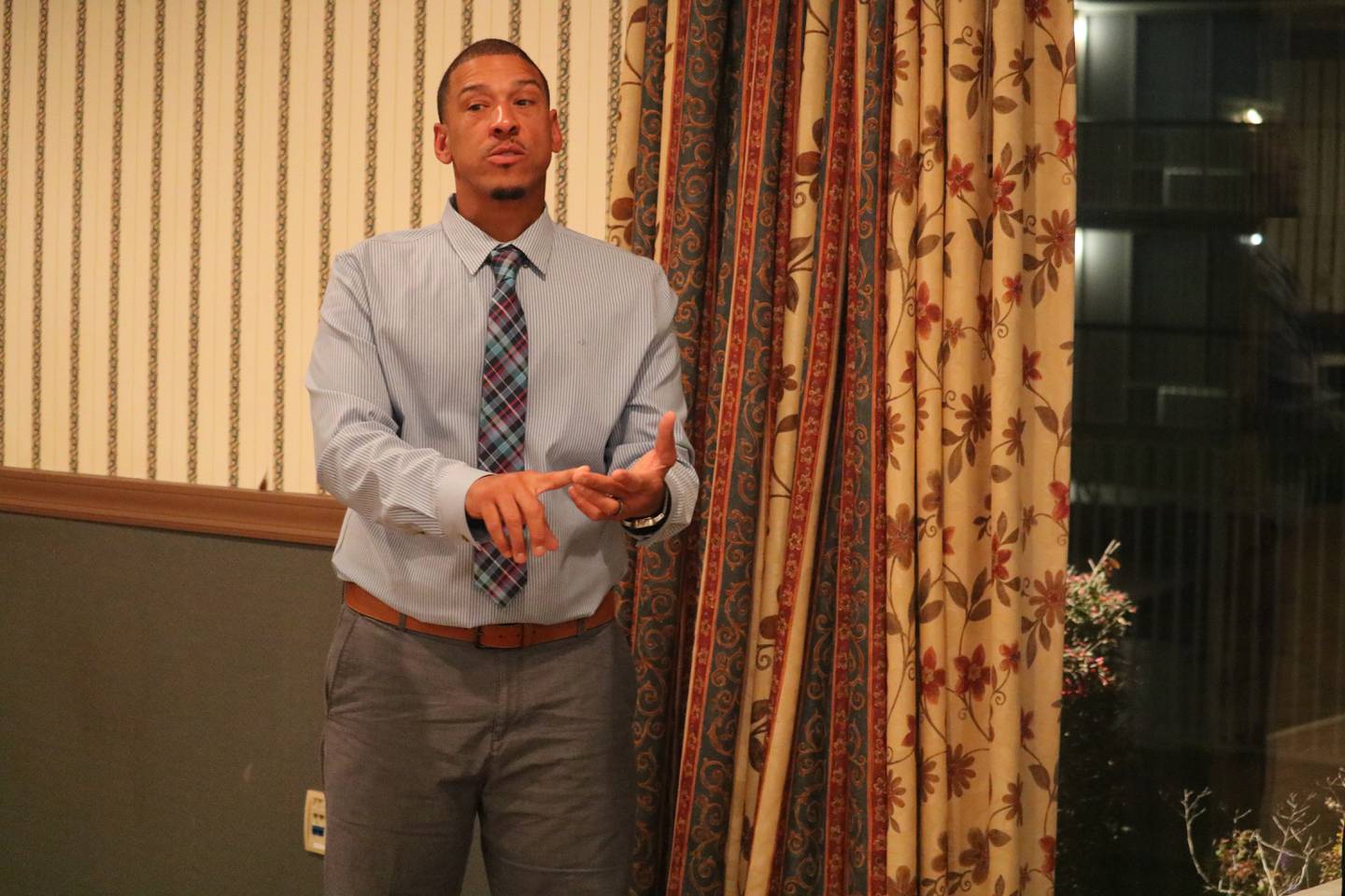 DeKalb Ward 7 aldermanic candidate John Walker speaks Thursday, Oct. 27, 2022 to those on hand for his meet-and-greet held at the Red Roof Inn & Suites in DeKalb.