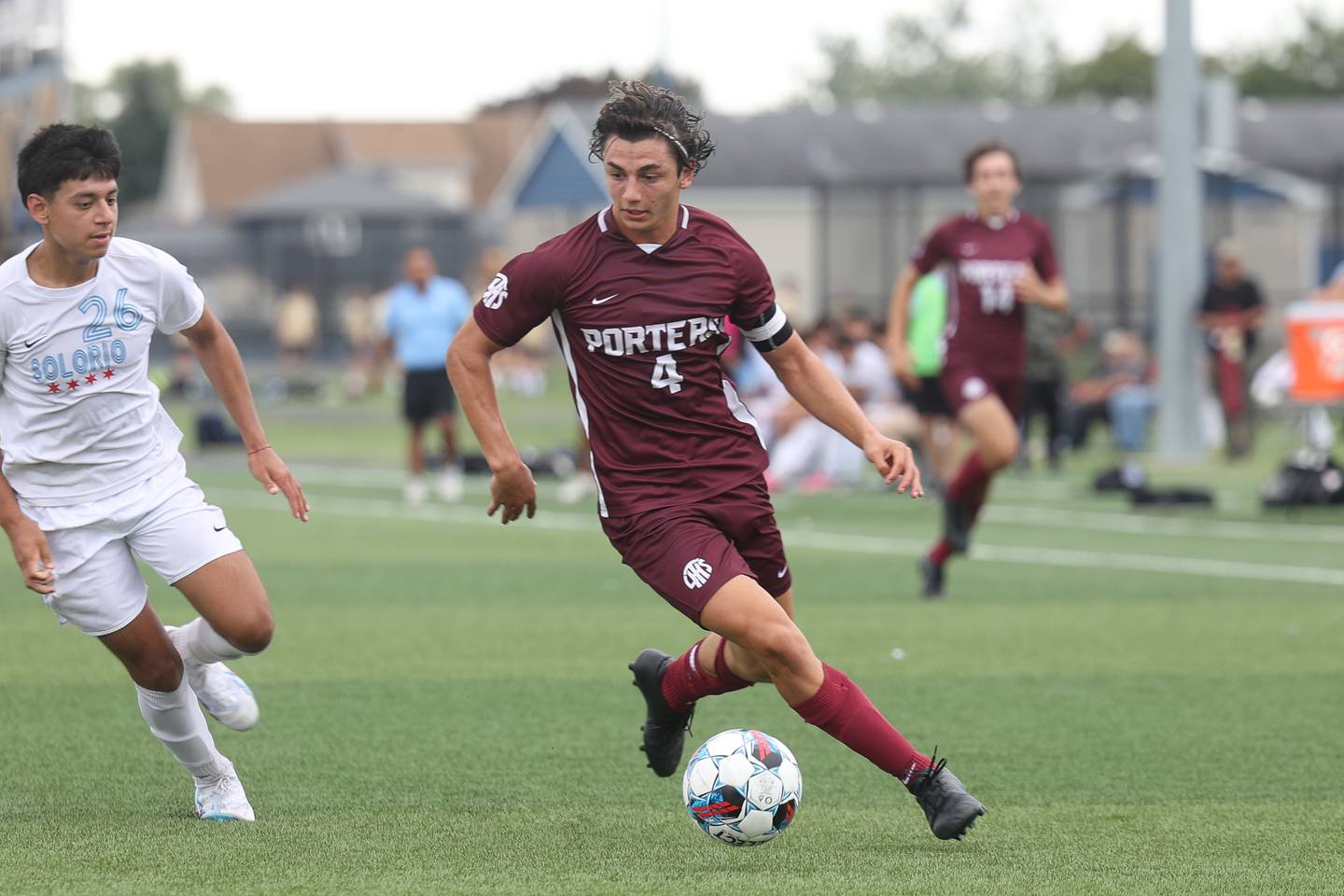 Lockport’s Nate Blazewski works the ball against Solorio in the Windy City Classic at Revis High School in Burbank on Saturday, Aug. 26, 2023.